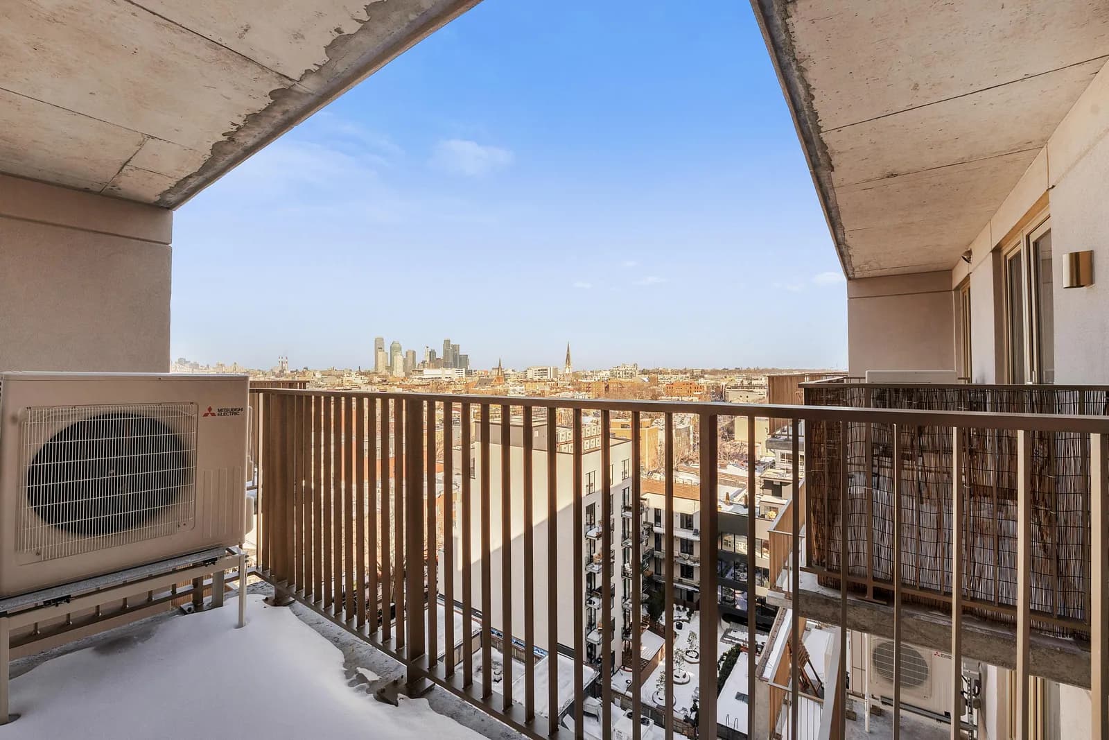 Private balcony overlooking Brooklyn and the Manhattan skyline
