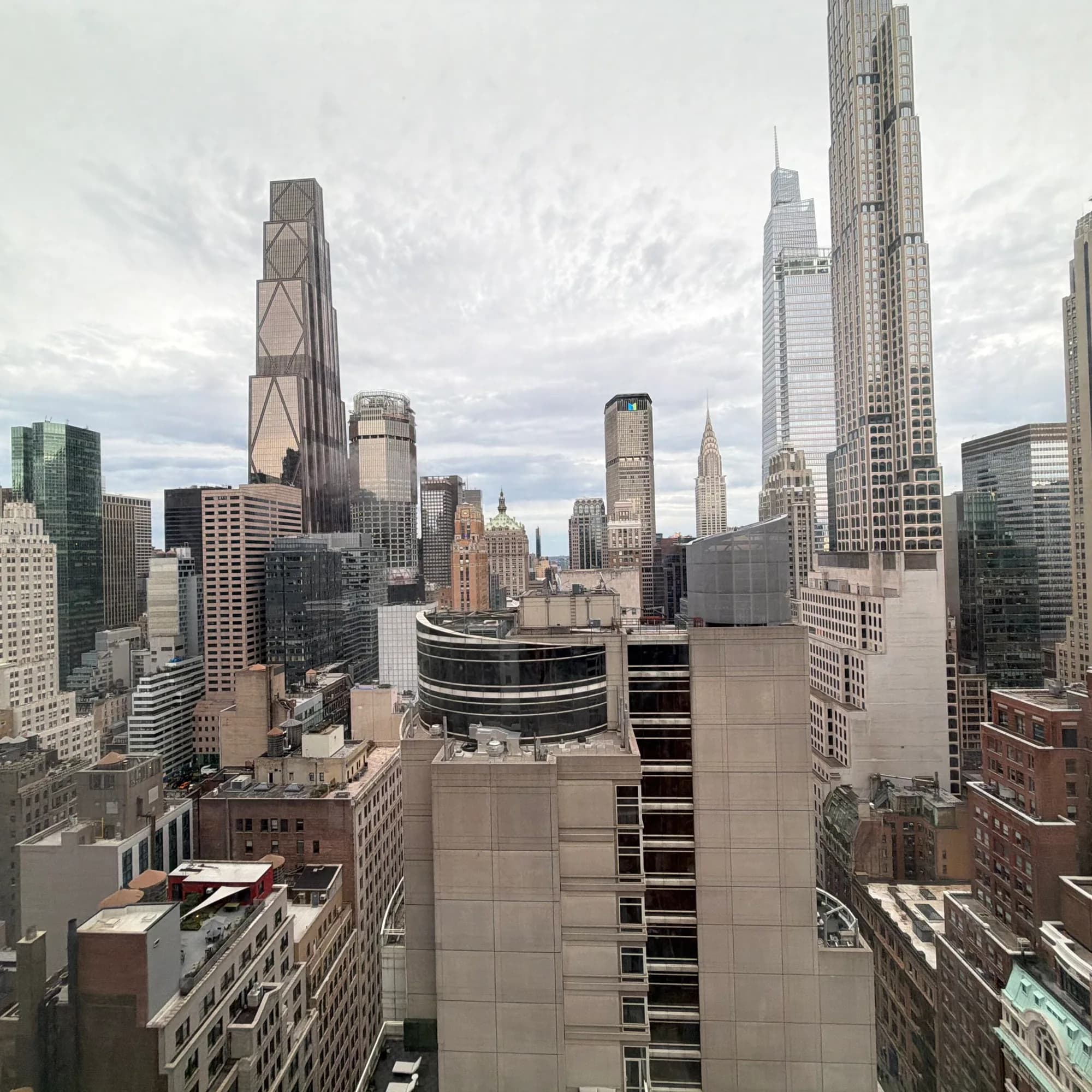 Daylight view of city towers and surrounding buildings