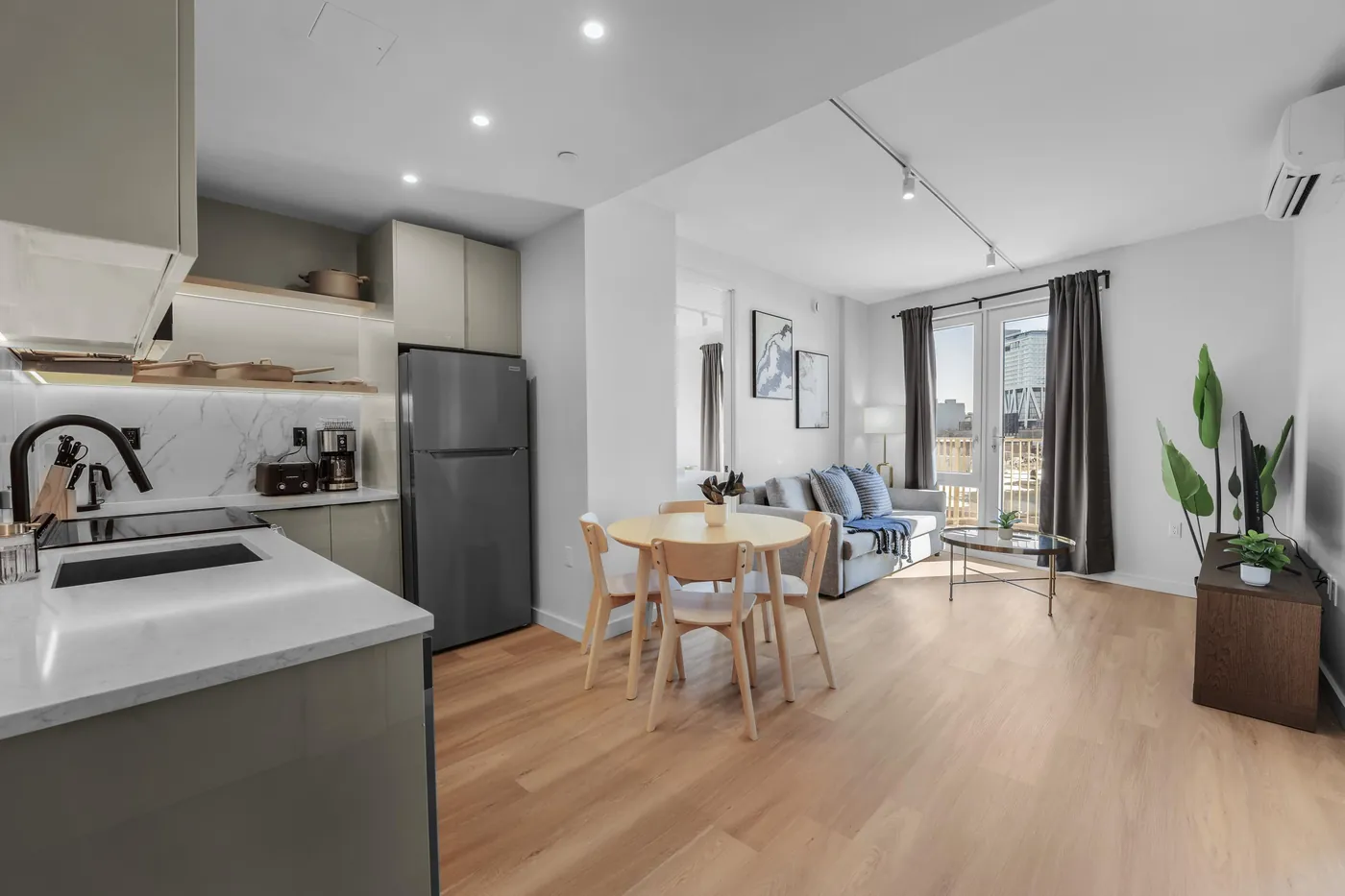 Kitchen and living space in a Waypost Brooklyn residence