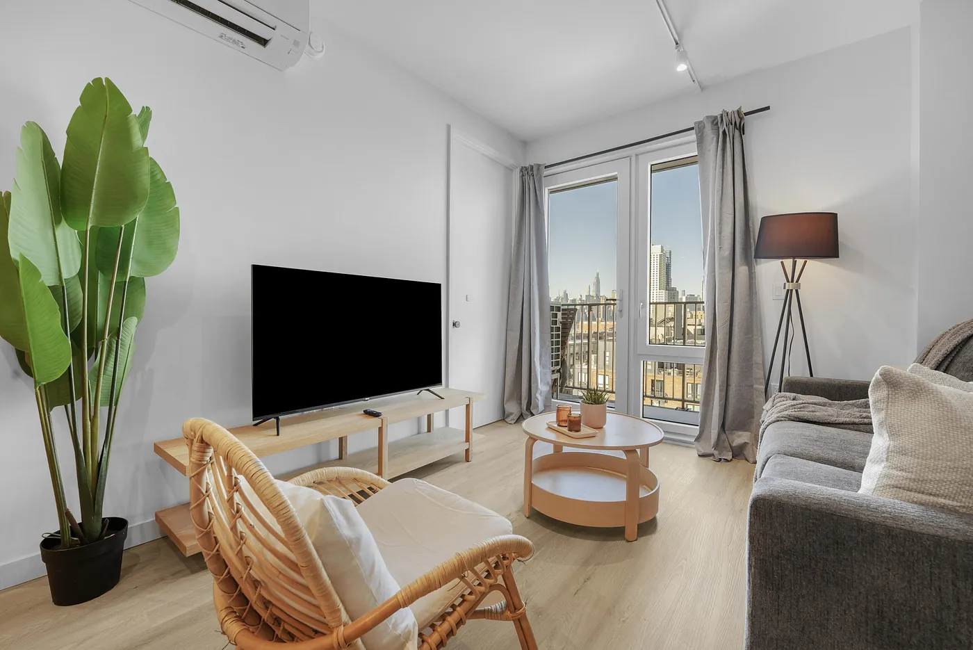 Furnished living and dining space in a Waypost Brooklyn residence
